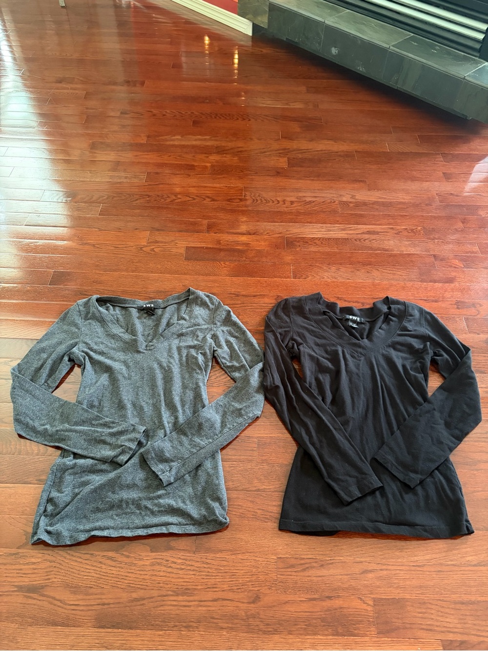 Pair of Women’s V Neck Long Sleeve Tops (one is Grey and one is Black) -size S
